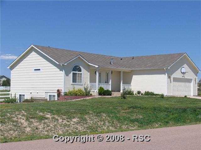 8672 Garrison Road Peyton, CO 80831 - Photo 1 of 15