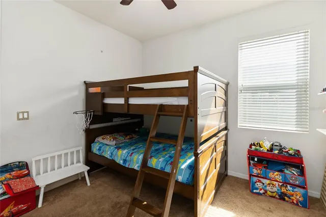 a bedroom with bunk bed