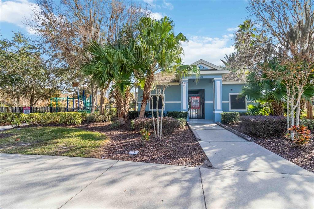4042 Eternity Circle St. Cloud, FL 34772 - Photo 33 of 35 a front view of a house with garden