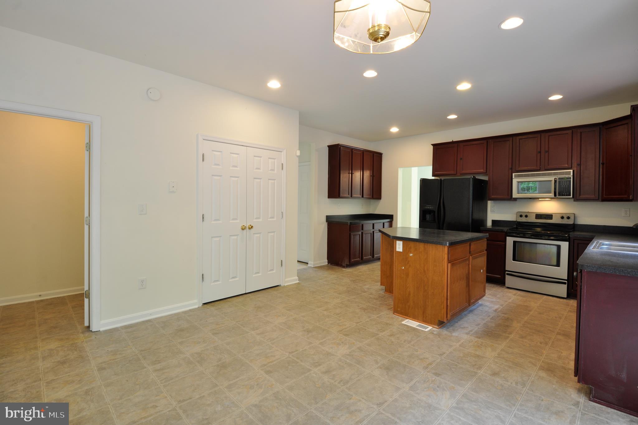 16257 Bundock Road King George, VA 22485 - Photo 14 of 32 Eat-in kitchen with double door pantry