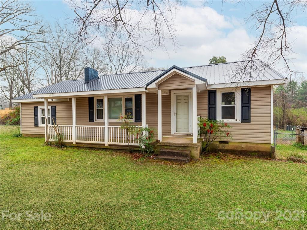 179 Harris Holly Springs Road Rutherfordton, NC 28139 - Photo 3 of 24 a view of a house with a yard