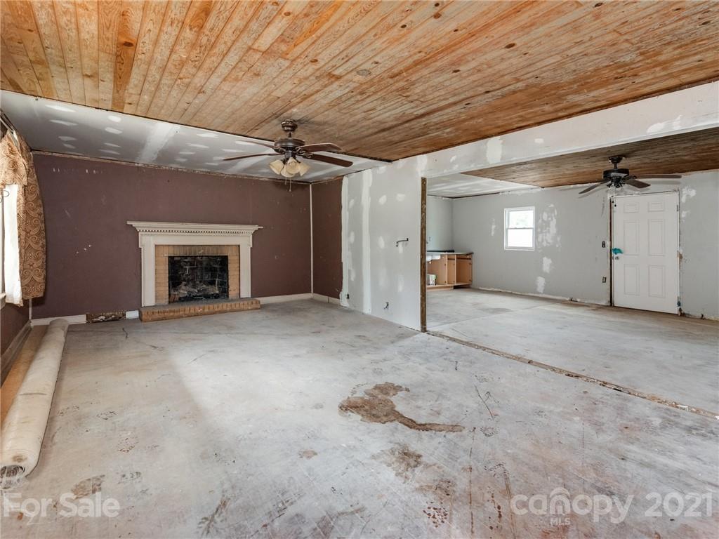 179 Harris Holly Springs Road Rutherfordton, NC 28139 - Photo 4 of 24 a view of a livingroom with a fireplace