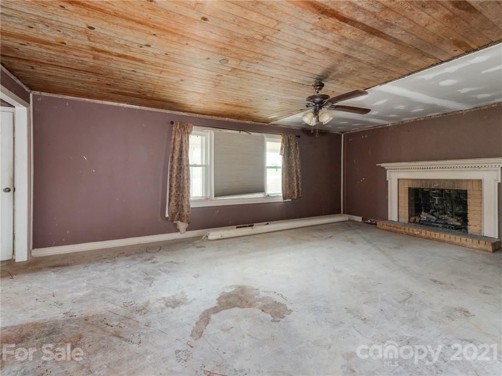 179 Harris Holly Springs Road Rutherfordton, NC 28139 - Photo 5 of 24 an empty room with windows