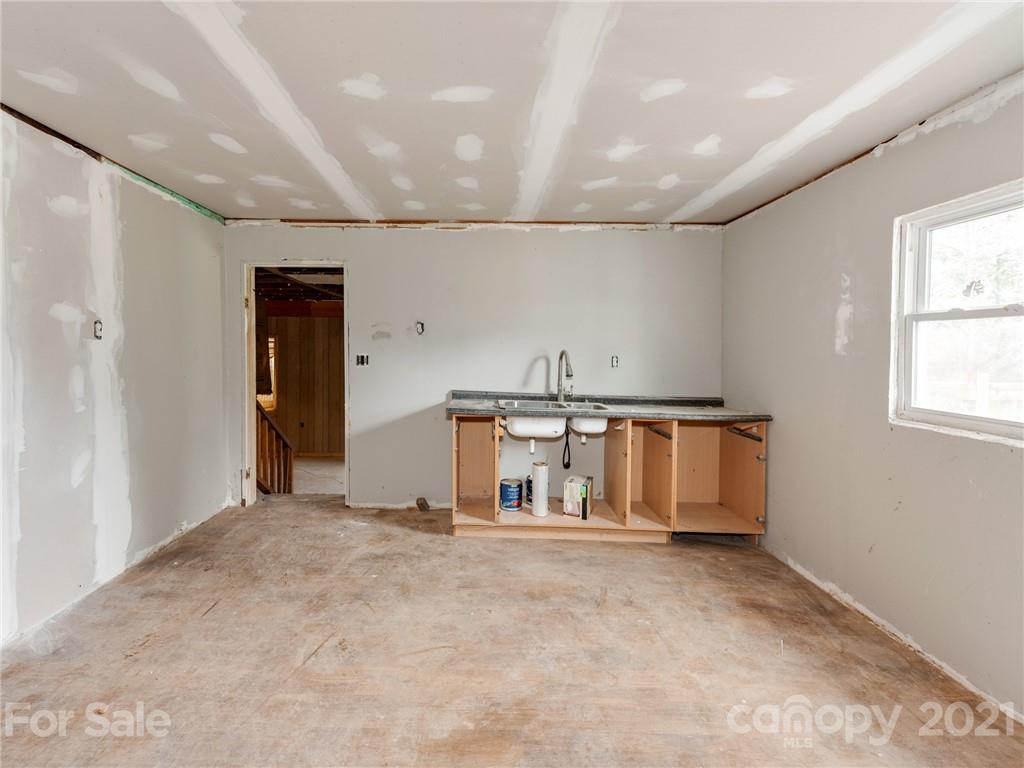179 Harris Holly Springs Road Rutherfordton, NC 28139 - Photo 10 of 24 a big room with wooden floor