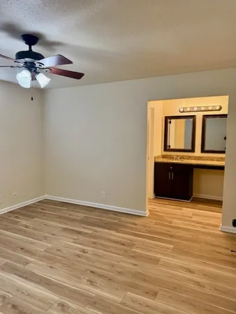a view of a livingroom with wooden floor