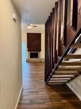 a view of entryway with wooden floor