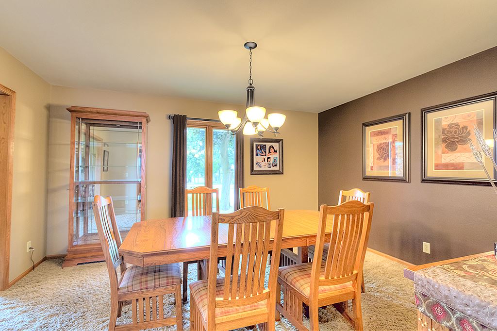 5948 Mc Donald Road Roscoe, IL 61073 - Photo 11 of 24 a dining room with furniture and window