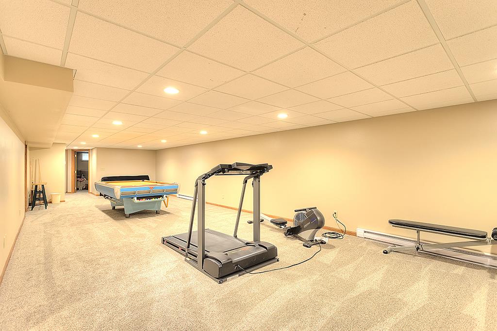 5948 Mc Donald Road Roscoe, IL 61073 - Photo 13 of 24 a view of a gym equipment