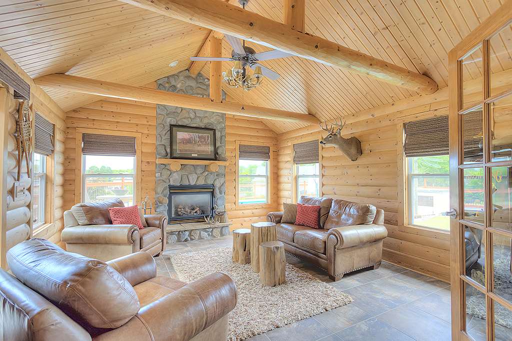 5948 Mc Donald Road Roscoe, IL 61073 - Photo 20 of 24 a living room with furniture and a fireplace