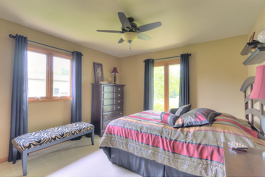 5948 Mc Donald Road Roscoe, IL 61073 - Photo 8 of 24 a bedroom with a bed and window