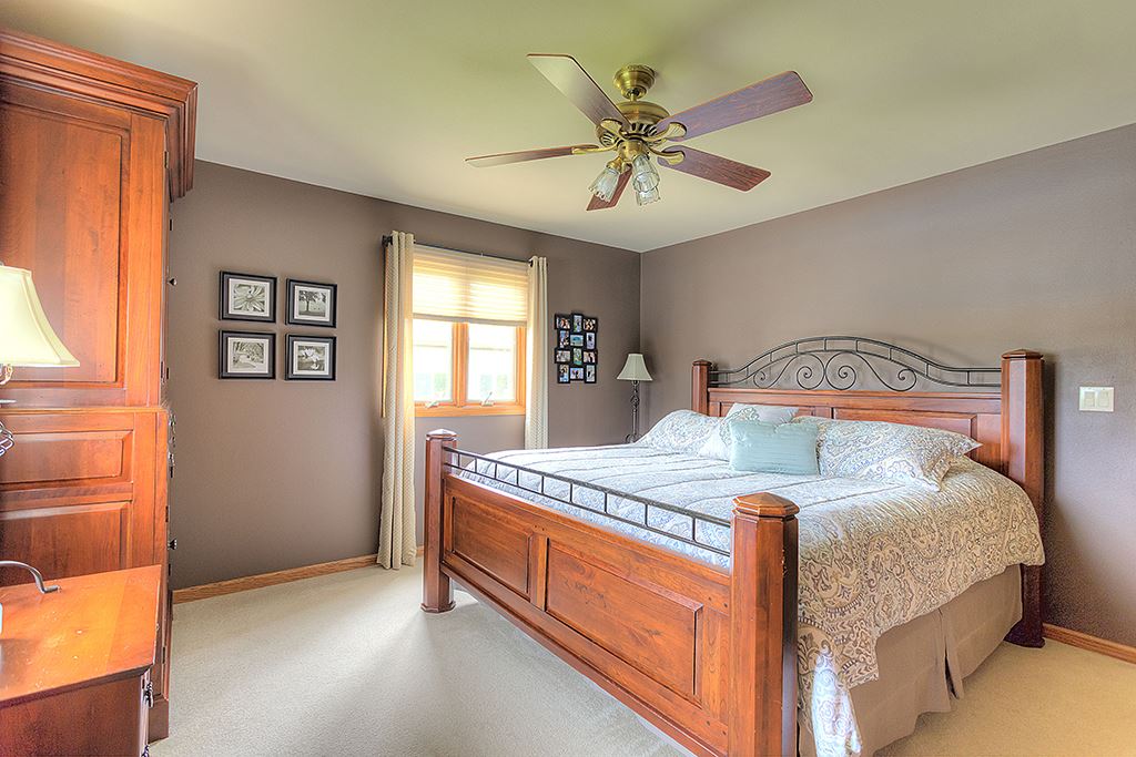5948 Mc Donald Road Roscoe, IL 61073 - Photo 9 of 24 a bedroom with a bed and window
