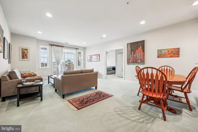 a living room with furniture and a couch
