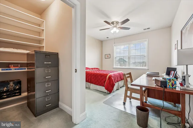 a bathroom with a sink toilet and mirror