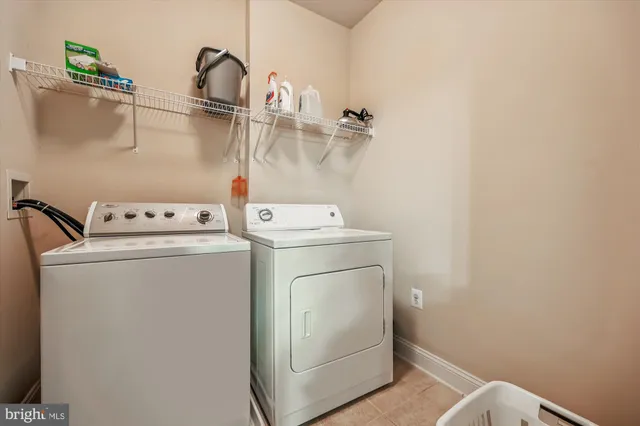 a car parked in front of a white house