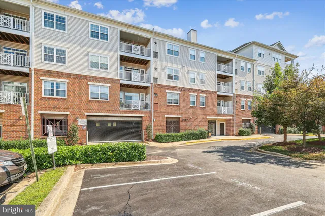 a view of a swimming pool with a patio and a yard