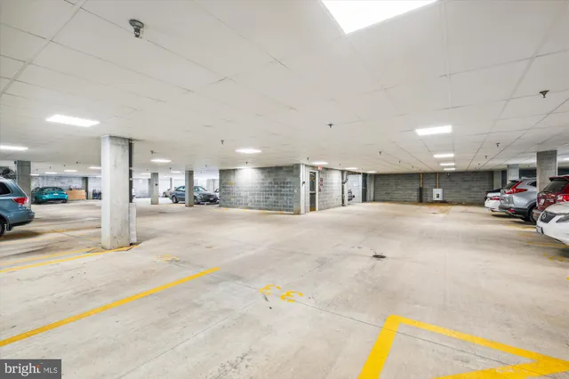 a view of a swimming pool with an outdoor space and seating area