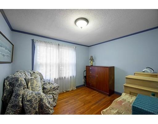 35 Beacon Street Amesbury, MA 01913 - Photo 11 of 17 a room with a bed and a window