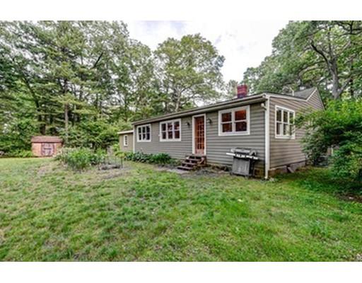 35 Beacon Street Amesbury, MA 01913 - Photo 12 of 17 a backyard of a house with table and chairs