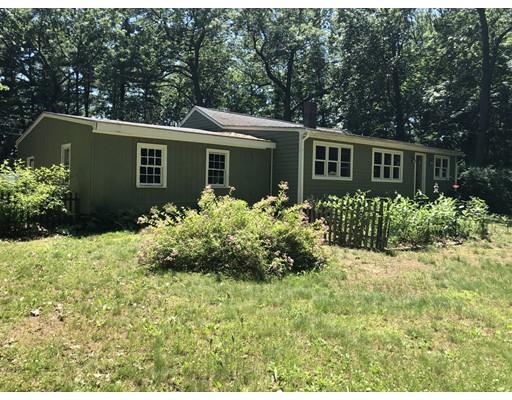 35 Beacon Street Amesbury, MA 01913 - Photo 13 of 17 a front view of house with yard and green space