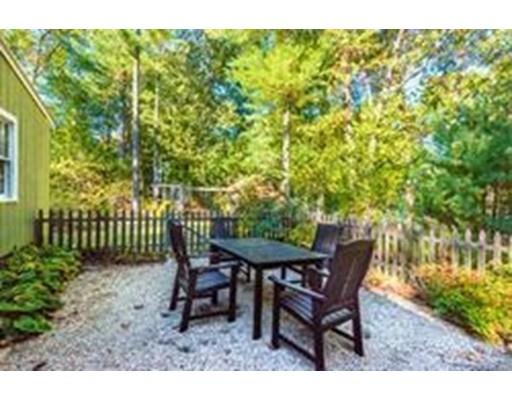 35 Beacon Street Amesbury, MA 01913 - Photo 14 of 17 a view of a chairs and table in the garden