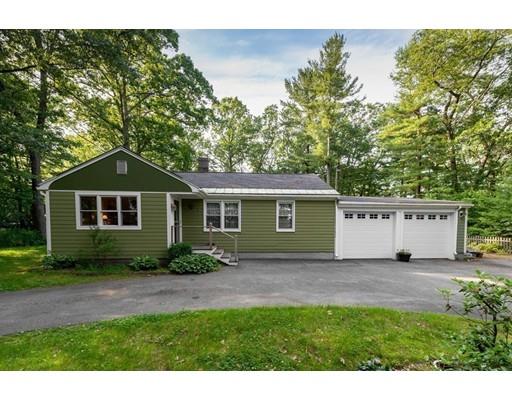35 Beacon Street Amesbury, MA 01913 - Photo 17 of 17 a front view of a house with garden