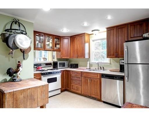 35 Beacon Street Amesbury, MA 01913 - Photo 4 of 17 a kitchen with a sink a refrigerator and window