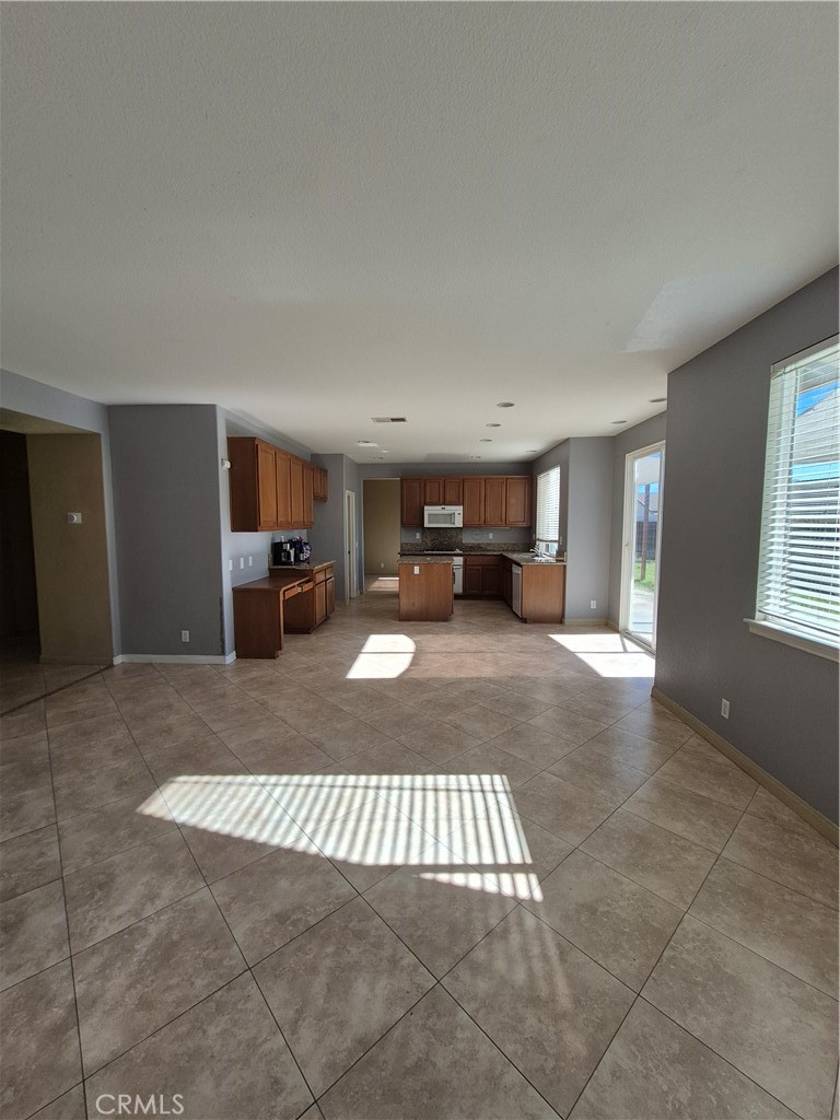 28841 Tonya Street Murrieta, CA 92563 - Photo 4 of 12 a view of living room filled with furniture and window