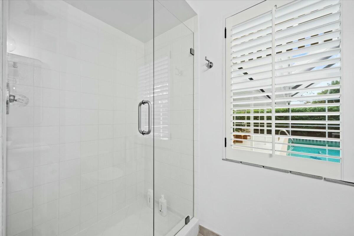 232 Cove Place Jupiter, FL 33469 - Photo 32 of 67 a view of a bathroom from a window