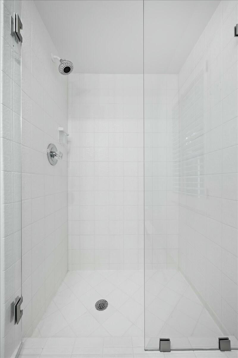 232 Cove Place Jupiter, FL 33469 - Photo 33 of 67 a bathroom with a shower