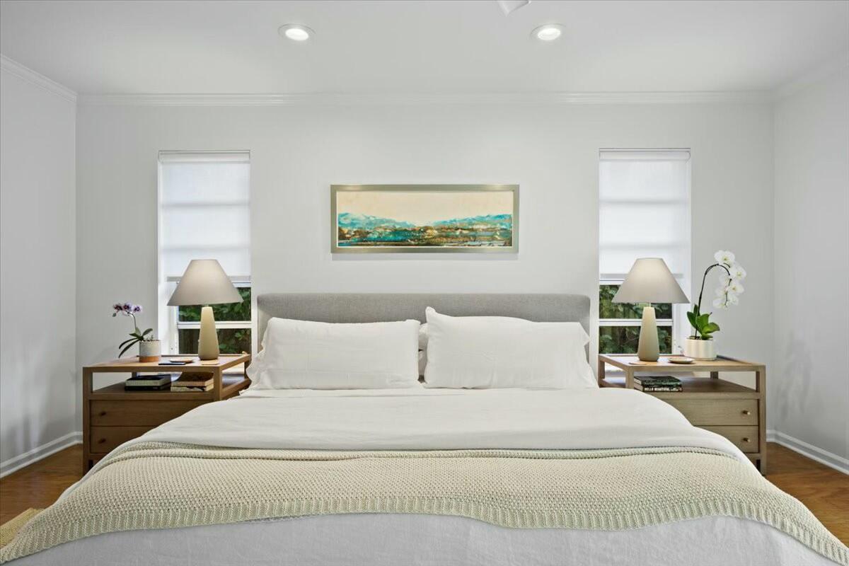 232 Cove Place Jupiter, FL 33469 - Photo 36 of 67 a bedroom with a bed and a painting on the wall
