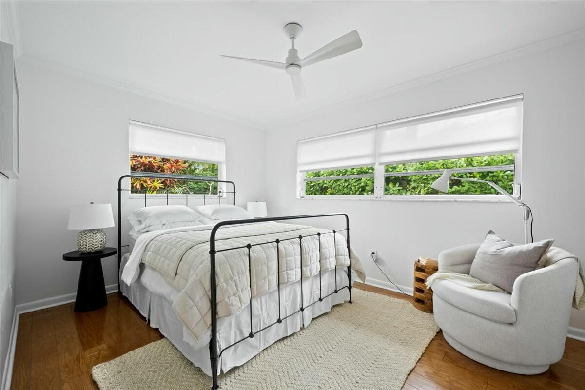 232 Cove Place Jupiter, FL 33469 - Photo 41 of 67 a bedroom with a bed and a window