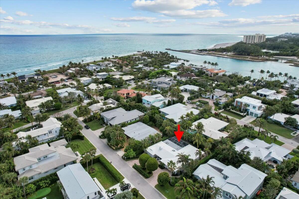 232 Cove Place Jupiter, FL 33469 - Photo 60 of 67 an aerial view of a city with lots of residential buildings