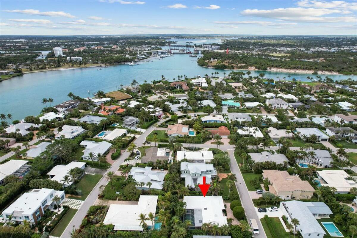 232 Cove Place Jupiter, FL 33469 - Photo 63 of 67 an aerial view of residential houses with outdoor space