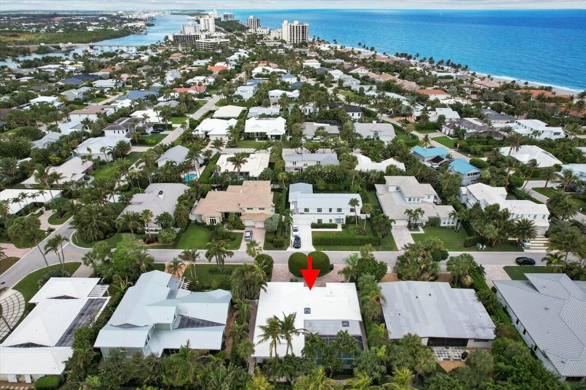 232 Cove Place Jupiter, FL 33469 - Photo 66 of 67 an aerial view of residential houses with outdoor space