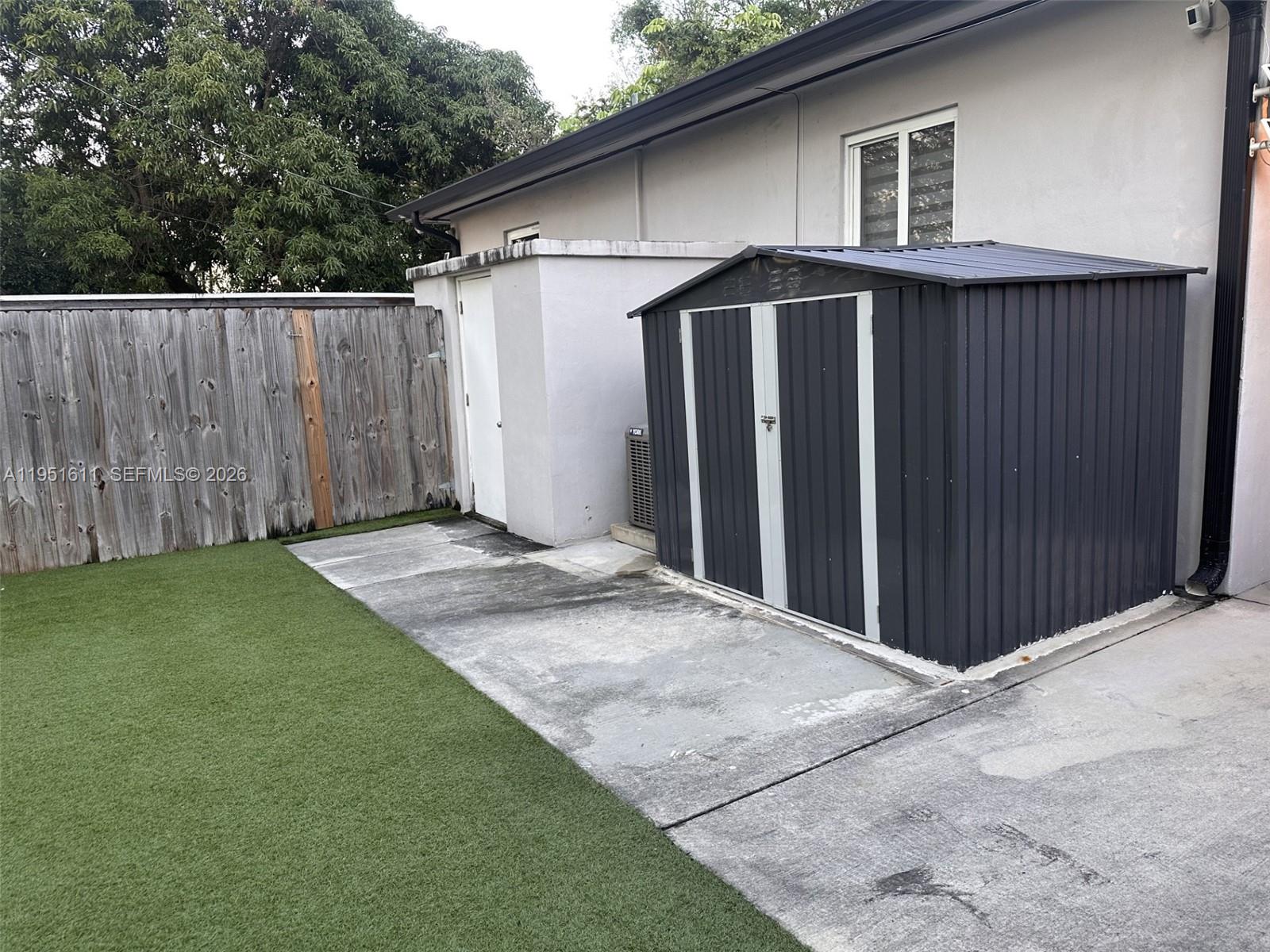 4485 Southwest 7th Street Miami, FL 33134 - Photo 23 of 26 a view of a house with a backyard