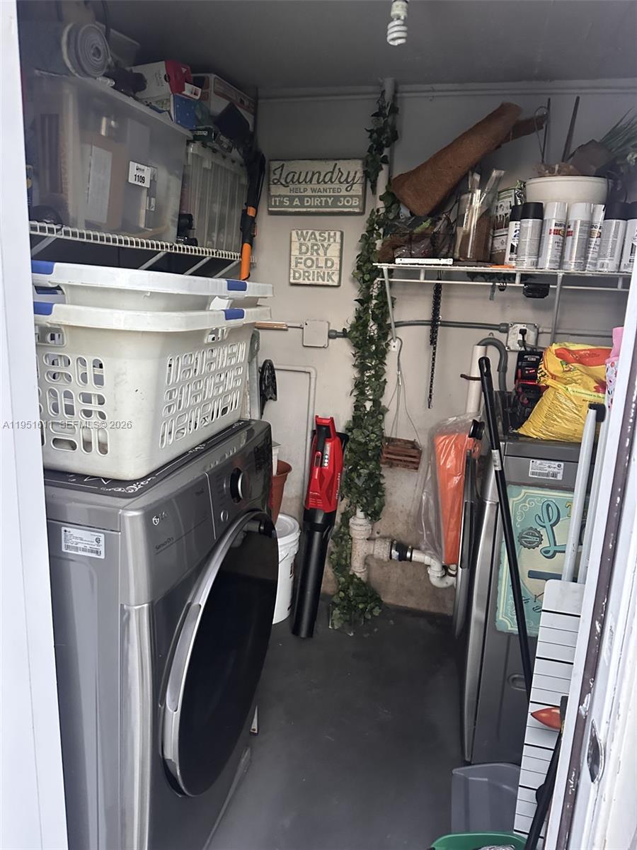 4485 Southwest 7th Street Miami, FL 33134 - Photo 24 of 26 a utility room with dryer and washer