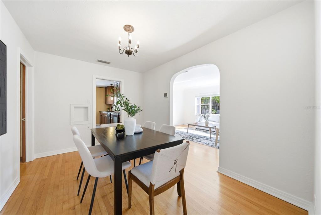 1715 Canton Street Orlando, FL 32803 - Photo 12 of 31 a view of a dining room with furniture and wooden floor