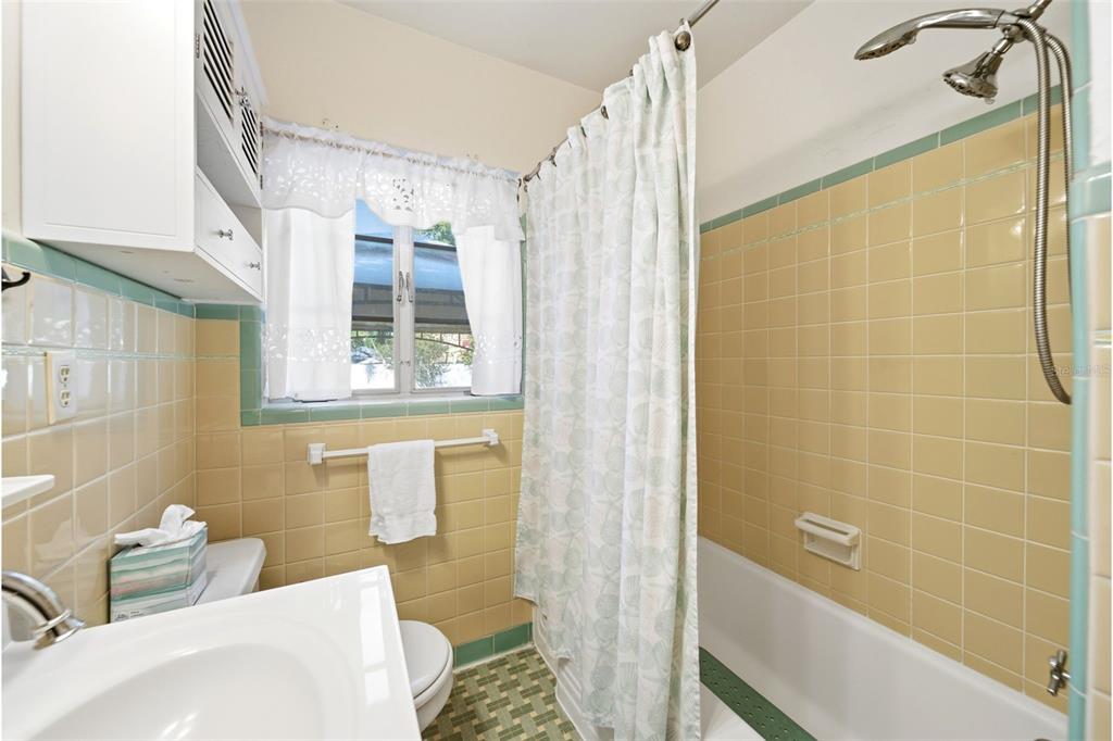 1715 Canton Street Orlando, FL 32803 - Photo 19 of 31 a bathroom with a sink and bathtub with shower
