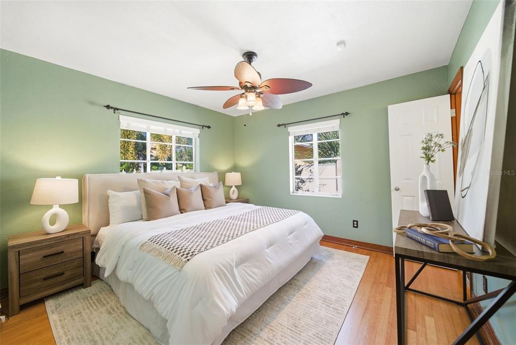 1715 Canton Street Orlando, FL 32803 - Photo 23 of 31 a bedroom with a bed and a chandelier