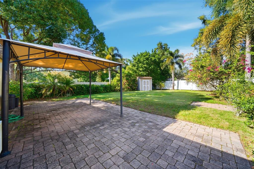 1715 Canton Street Orlando, FL 32803 - Photo 28 of 31 a view of a house with backyard and sitting area
