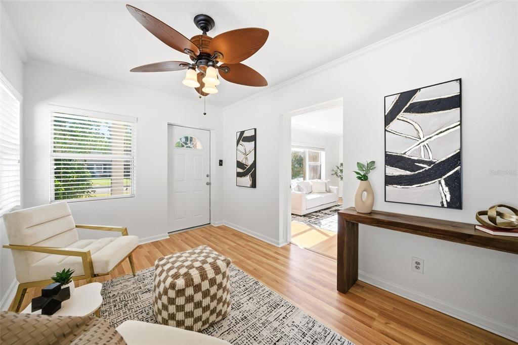 1715 Canton Street Orlando, FL 32803 - Photo 6 of 31 a bedroom with a bed and wooden floor