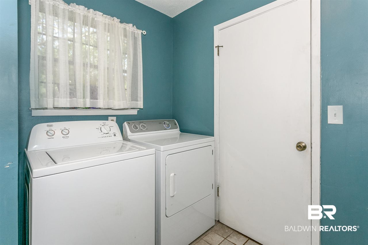 2408 Ridge Road East Gulf Shores, AL 36542 - Photo 14 of 30 Full-size laundry room