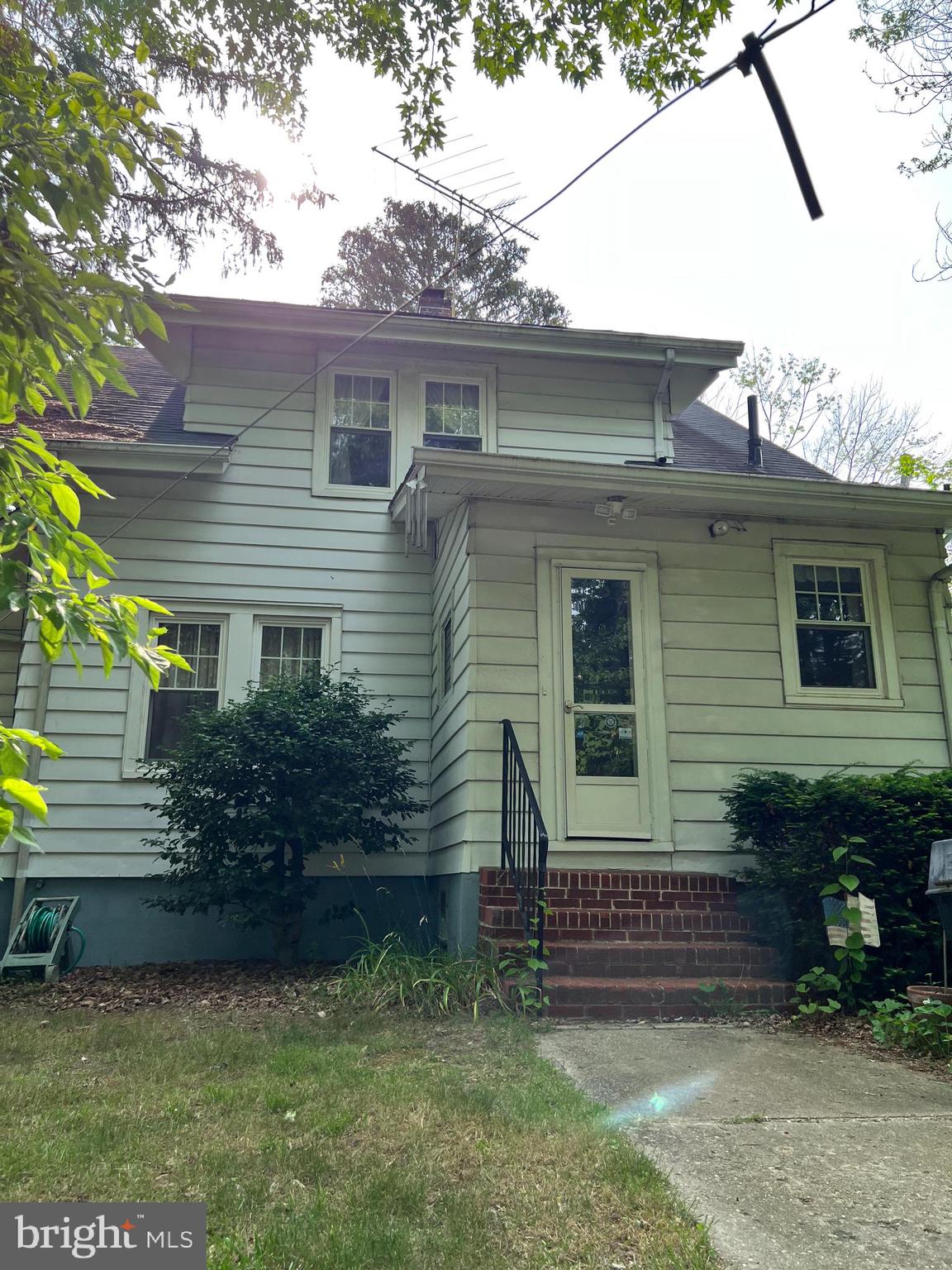 735 South Spring Road Vineland, NJ 08361 - Photo 5 of 53 a front view of a house with a yard