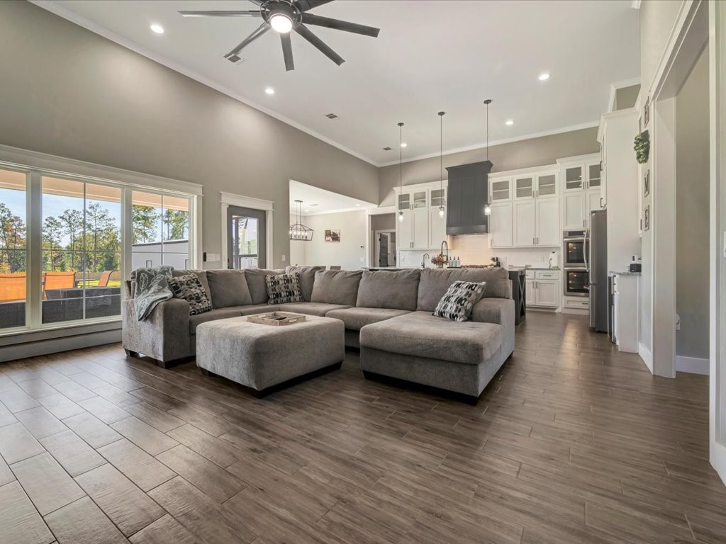 387 C C Road Diboll, TX 75941 - Photo 11 of 50 a living room with furniture and a large window