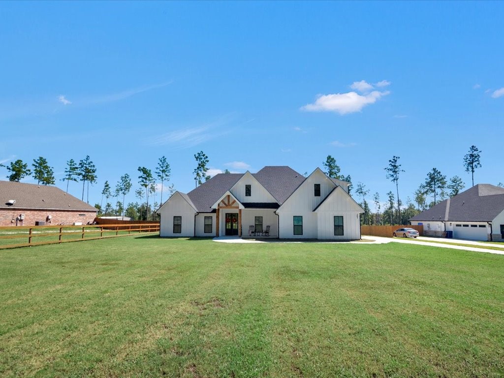 387 C C Road Diboll, TX 75941 - Photo 3 of 50 a view of a house with a big yard