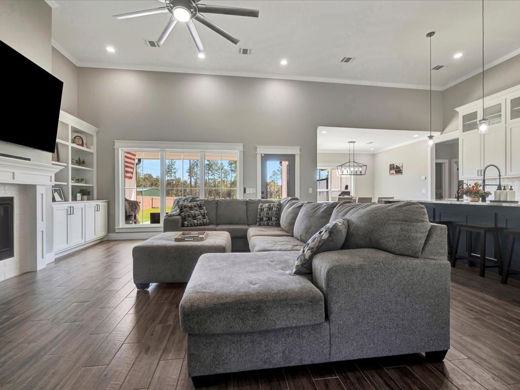387 C C Road Diboll, TX 75941 - Photo 8 of 50 a living room with furniture and a flat screen tv