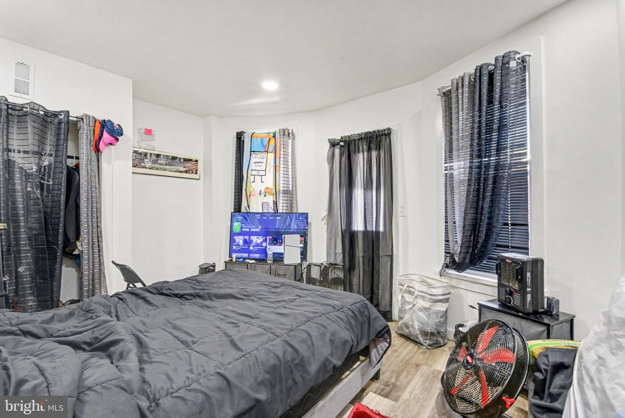 2141 Penn Street Harrisburg, PA 17110 - Photo 14 of 19 a bedroom with a bed and a window