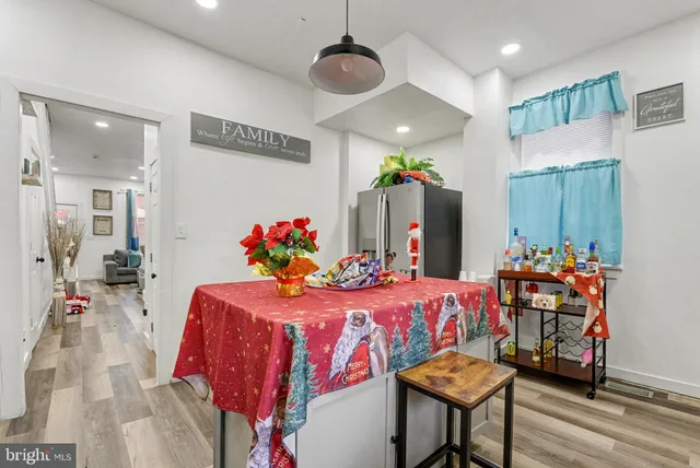 a bedroom with furniture and a chandelier