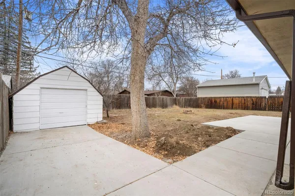 a view of a backyard of a house