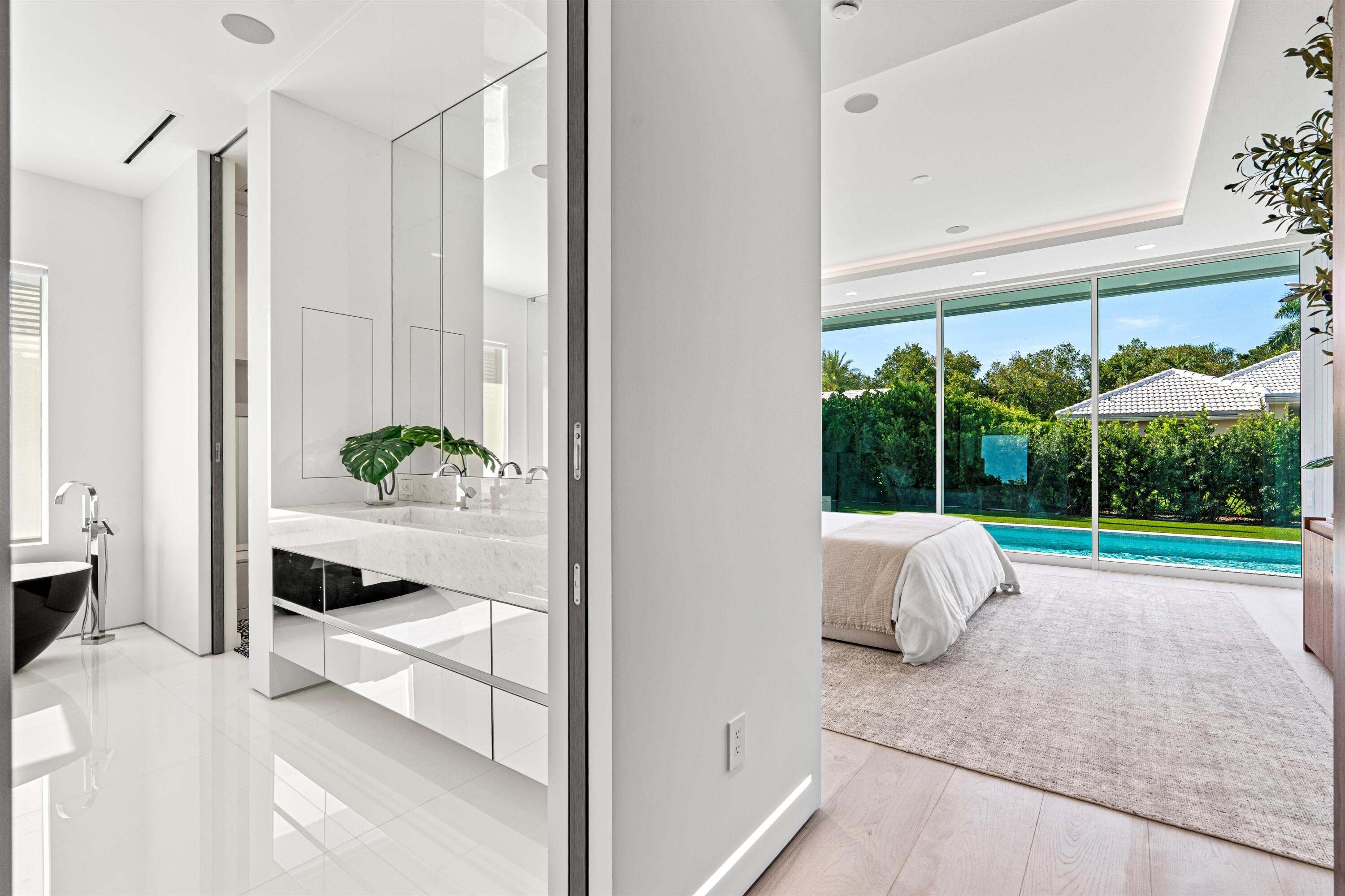 610 Juneberry Court Boca Raton, FL 33486 - Photo 25 of 45 PRIMARY_BATHROOM_AND_BED